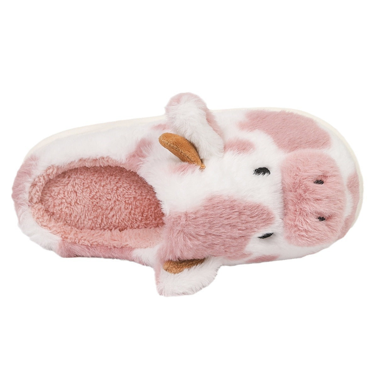 Pantoufles mignonnes en forme de vaches pour l'hiver. Chaussons confortables et chauds.